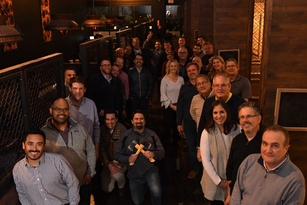 Bullseye coaches with a corporate group at the axe lounge