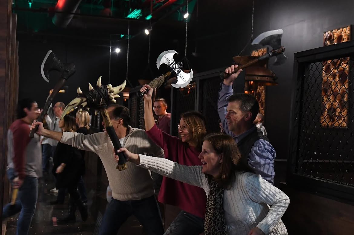 Corporate group enjoying axe throwing at Bullseye