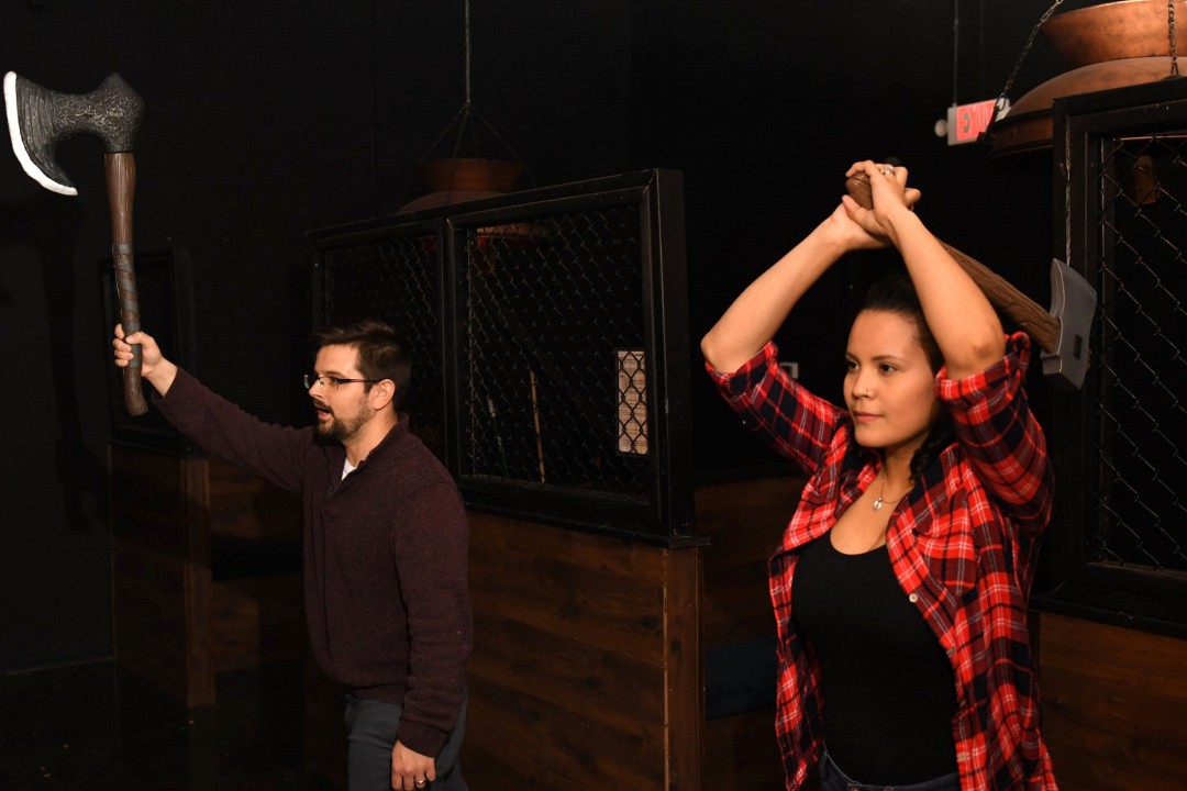 Couple axe throwing at Bullseye