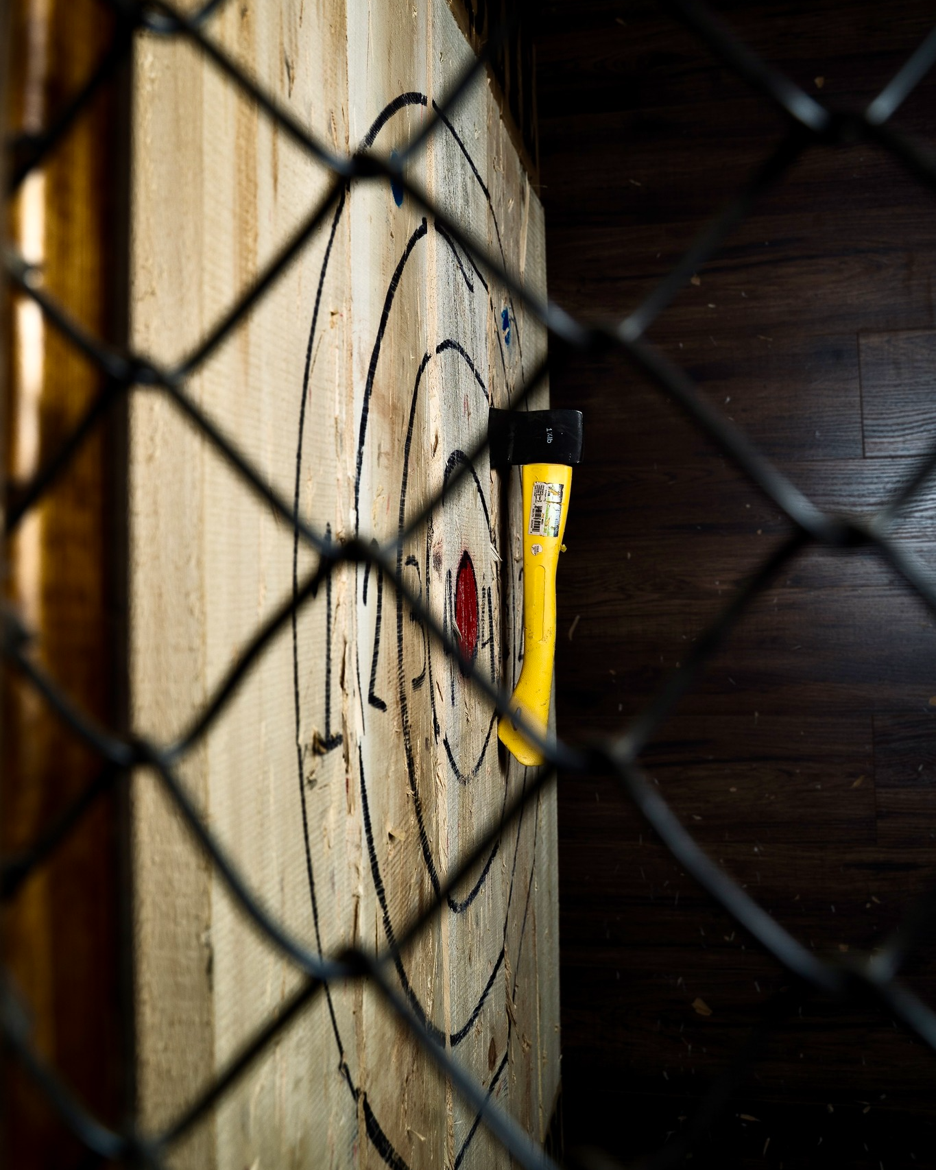 Axe embedded in a Bullseye target